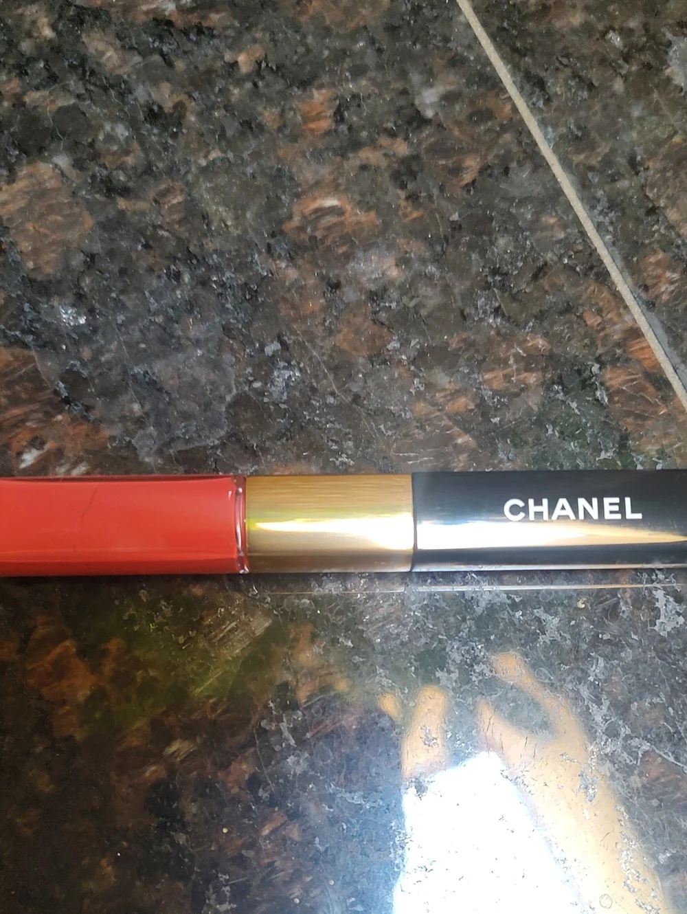 CHANEL Dual-Ended Lip Color in Vibrant Red with Gold Accents